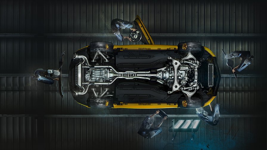 L'immagine mostra una AMG GT con vernice gialla vista dal basso.